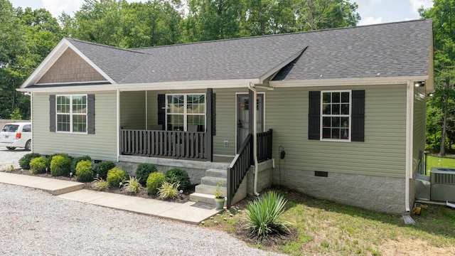 785 Grindstone Hollow Rd, Dickson, TN 37055 - view of front facade with crawl space, covered porch, and a shingled roof