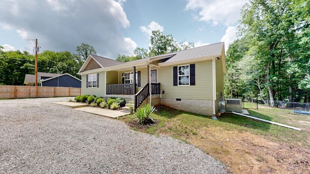785 Grindstone Hollow Rd, Dickson, TN 37055 - view of front of home with crawl space, a porch, and driveway