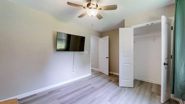 785 Grindstone Hollow Rd, Dickson, TN 37055 - unfurnished bedroom featuring light wood-style floors, a closet, and ceiling fan