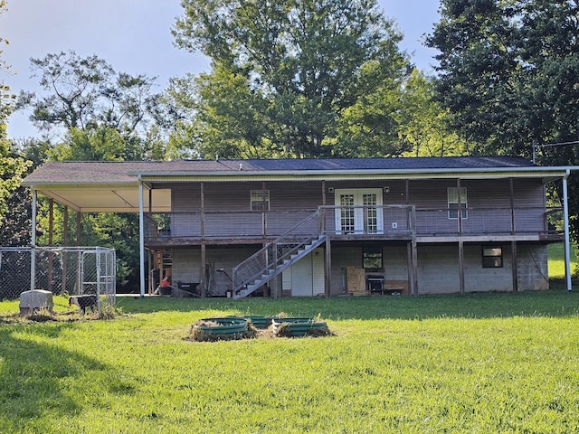 770 Jack Smith Rd, Dunlap, TN 37327 - rear view of property featuring stairs, a fire pit, and a wooden deck