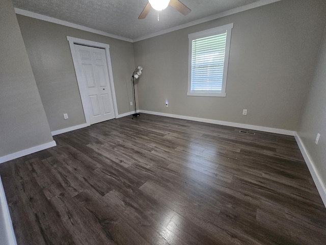 770 Jack Smith Rd, Dunlap, TN 37327 - spare room featuring dark wood-type flooring, a ceiling fan, crown molding, and a textured ceiling