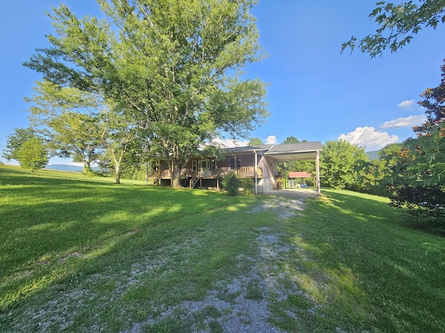 770 Jack Smith Rd, Dunlap, TN 37327 - view of grassy yard featuring an attached carport