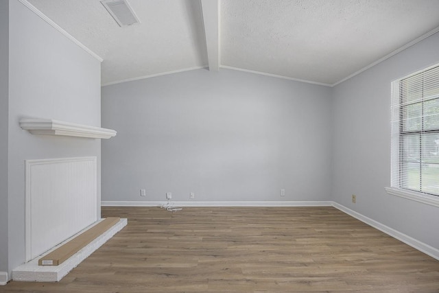 3332 Oak Trees Ct, Antioch, TN 37013 - empty room featuring crown molding, wood finished floors, and a textured ceiling