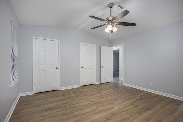 3332 Oak Trees Ct, Antioch, TN 37013 - unfurnished bedroom with wood finished floors, two closets, and ceiling fan