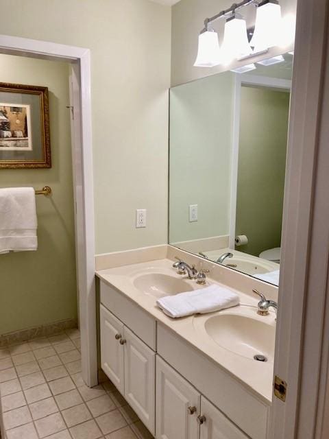 6607 Ormond Dr, Nashville, TN 37205 - bathroom featuring double vanity and tile patterned flooring