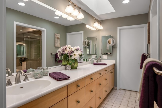 6607 Ormond Dr, Nashville, TN 37205 - full bath with a skylight, double vanity, a shower stall, tile patterned flooring, and recessed lighting