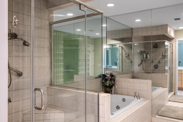 6607 Ormond Dr, Nashville, TN 37205 - full bathroom featuring a shower stall, a jetted tub, and recessed lighting