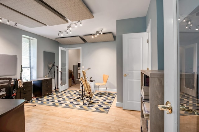6607 Ormond Dr, Nashville, TN 37205 - office with light wood-style floors and rail lighting