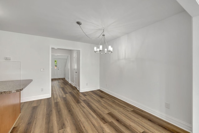 4247 Aurora Cir, Murfreesboro, TN 37127 - unfurnished dining area with dark wood-style flooring and a chandelier
