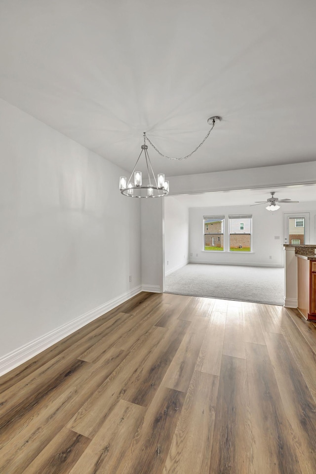 4247 Aurora Cir, Murfreesboro, TN 37127 - unfurnished dining area with a chandelier, wood finished floors, and ceiling fan
