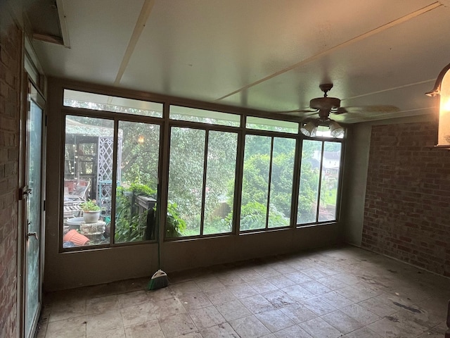 3412 Harborwood Cir, Nashville, TN 37214 - unfurnished sunroom with brick wall and stone finish floors