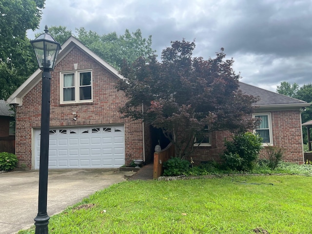 3412 Harborwood Cir, Nashville, TN 37214 - view of front of house featuring brick siding, driveway, a front yard, and a garage