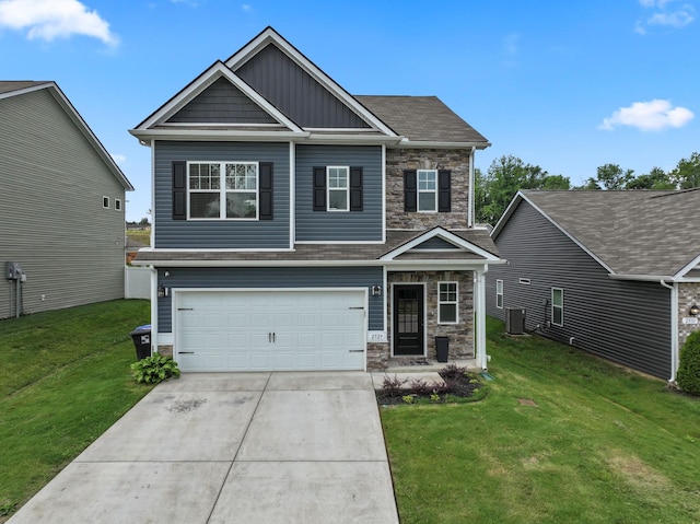 2529 Precast Dr, Columbia, TN 38401 - craftsman inspired home with stone siding, board and batten siding, a front yard, driveway, and an attached garage