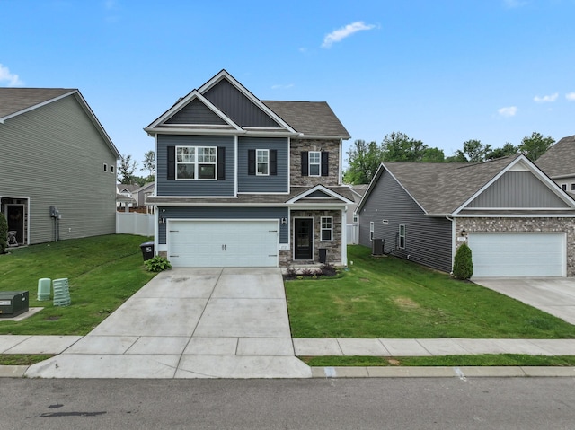 2529 Precast Dr, Columbia, TN 38401 - craftsman house with stone siding, driveway, board and batten siding, an attached garage, and a shingled roof