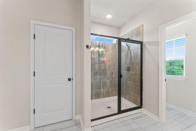 2529 Precast Dr, Columbia, TN 38401 - full bathroom with a shower stall and baseboards