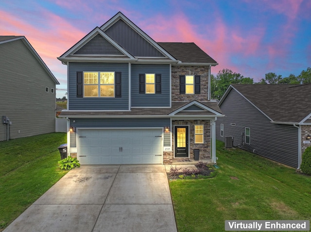 2529 Precast Dr, Columbia, TN 38401 - craftsman-style house featuring stone siding, board and batten siding, an attached garage, driveway, and a yard