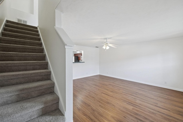 354 Arapaho Dr, Murfreesboro, TN 37128 - stairway with a ceiling fan and wood finished floors