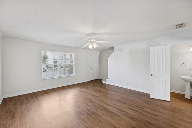 354 Arapaho Dr, Murfreesboro, TN 37128 - empty room featuring ceiling fan, crown molding, and dark wood-type flooring