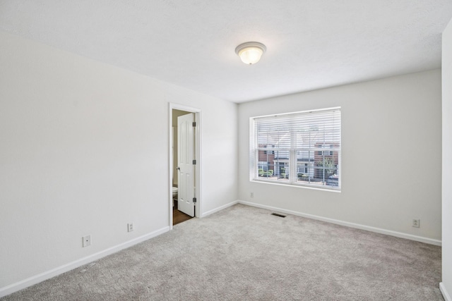 354 Arapaho Dr, Murfreesboro, TN 37128 - carpeted empty room with baseboards