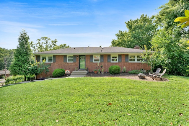 106 Dellrose Dr, Nashville, TN 37214 - ranch-style house featuring an outdoor fire pit, brick siding, a front lawn, and a chimney