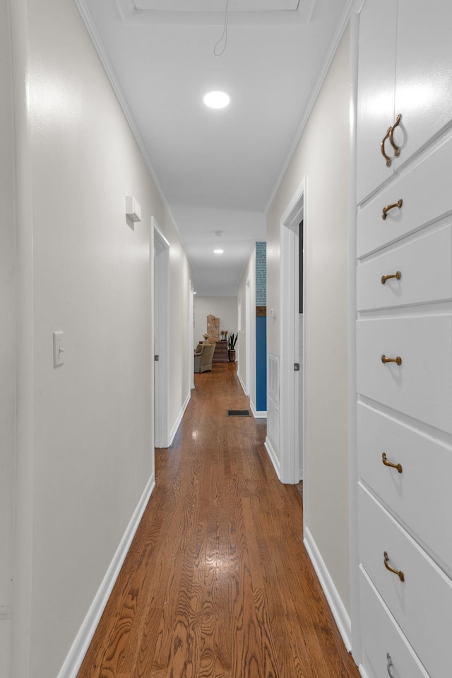 106 Dellrose Dr, Nashville, TN 37214 - hall featuring dark wood finished floors, ornamental molding, and recessed lighting