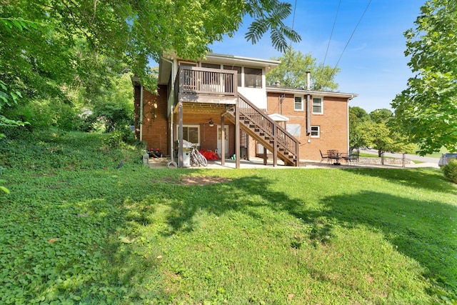 106 Dellrose Dr, Nashville, TN 37214 - back of house featuring a sunroom, brick siding, a patio, and stairway