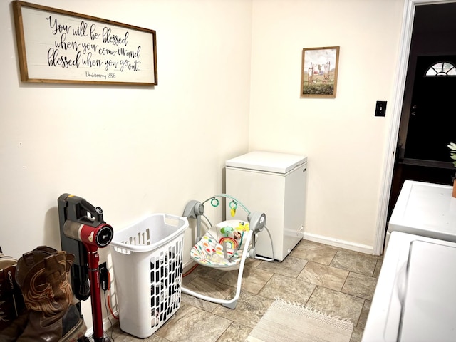 30429 Sims St, Ardmore, TN 38449 - laundry area featuring washer and clothes dryer and stone finish flooring