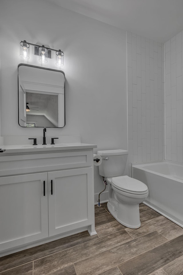 445 Old Pond Ln, Dickson, TN 37055 - full bath with vanity, wood finished floors, and shower / bathtub combination