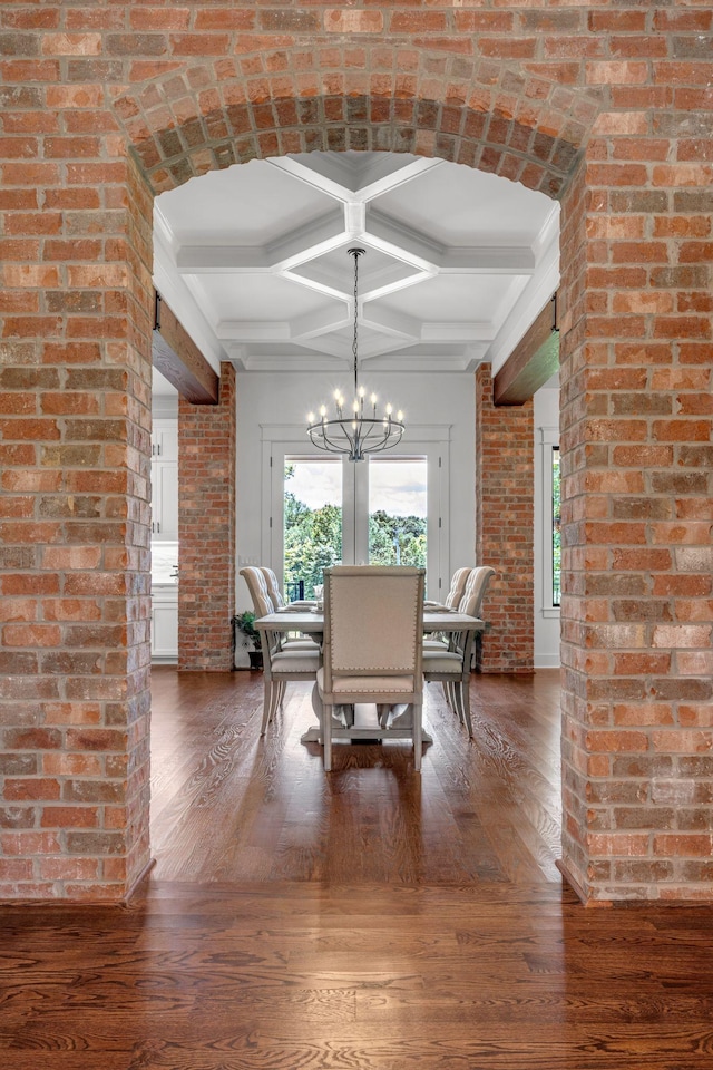 445 Old Pond Ln, Dickson, TN 37055 - dining space with hardwood / wood-style floors, a chandelier, coffered ceiling, beam ceiling, and brick wall