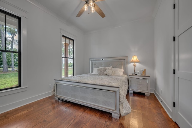 445 Old Pond Ln, Dickson, TN 37055 - bedroom with crown molding, dark wood-style flooring, and ceiling fan