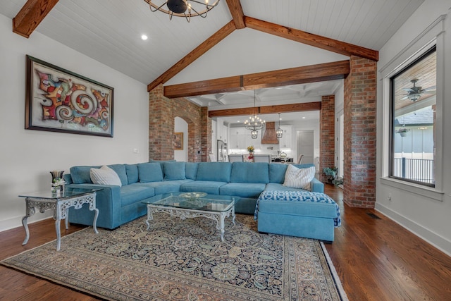 445 Old Pond Ln, Dickson, TN 37055 - living area with a chandelier, dark wood-style floors, and brick wall