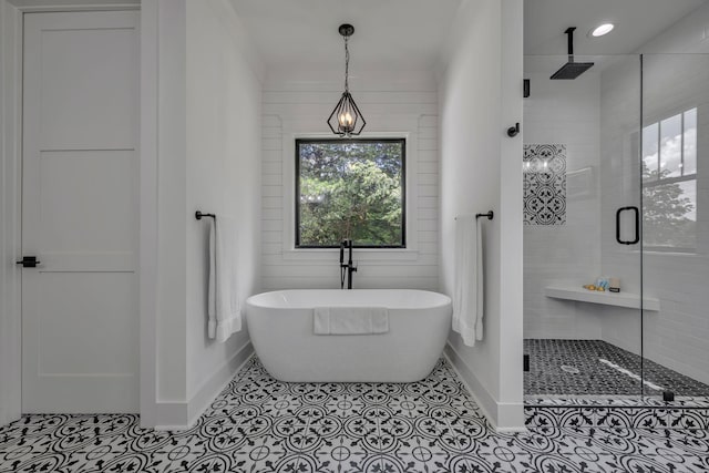 445 Old Pond Ln, Dickson, TN 37055 - full bathroom featuring a stall shower, a freestanding bath, and tile patterned flooring