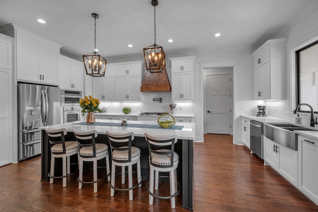 445 Old Pond Ln, Dickson, TN 37055 - kitchen featuring appliances with stainless steel finishes, a chandelier, backsplash, light countertops, and recessed lighting