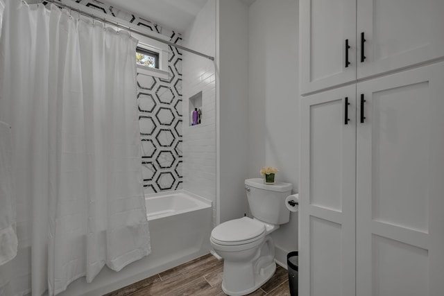 445 Old Pond Ln, Dickson, TN 37055 - bathroom with shower / bath combo with shower curtain and wood finished floors