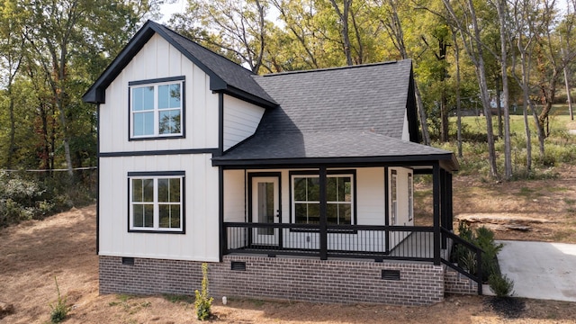2346 Rhea Branch Rd, Ethridge, TN 38456 - view of front facade featuring a shingled roof, a porch, crawl space, and board and batten siding