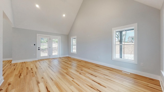 2346 Rhea Branch Rd, Ethridge, TN 38456 - unfurnished living room featuring high vaulted ceiling, light wood finished floors, and recessed lighting