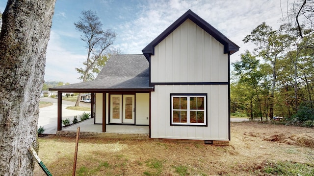 2346 Rhea Branch Rd, Ethridge, TN 38456 - back of property featuring a shingled roof and board and batten siding