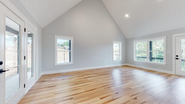 2346 Rhea Branch Rd, Ethridge, TN 38456 - empty room featuring high vaulted ceiling, healthy amount of natural light, light wood-style floors, and recessed lighting