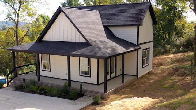 2346 Rhea Branch Rd, Ethridge, TN 38456 - view of home's exterior with a shingled roof and a porch