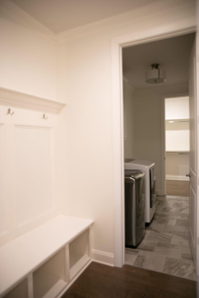 1023 Echelon Dr, Franklin, TN 37064 - mudroom with washing machine and clothes dryer and ornamental molding