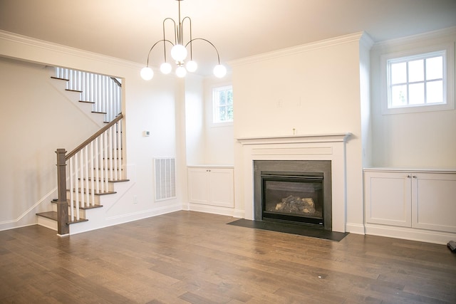 1023 Echelon Dr, Franklin, TN 37064 - unfurnished living room featuring stairway, ornamental molding, wood finished floors, and healthy amount of natural light