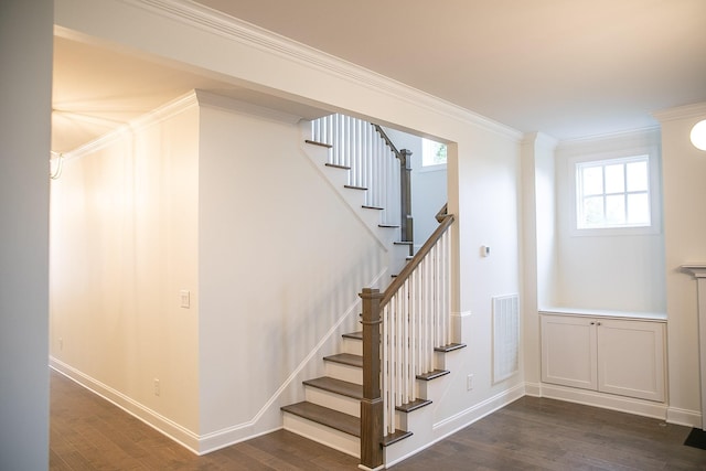 1023 Echelon Dr, Franklin, TN 37064 - staircase with wood finished floors and ornamental molding