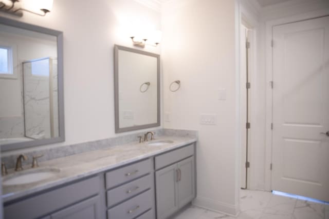 1023 Echelon Dr, Franklin, TN 37064 - bathroom featuring marble look tiles, double vanity, a marble finish shower, and crown molding