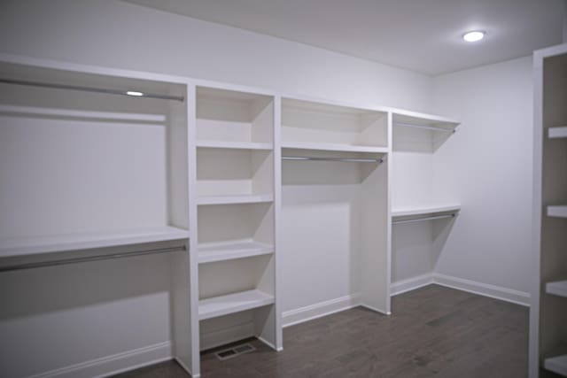 1023 Echelon Dr, Franklin, TN 37064 - walk in closet with dark wood finished floors