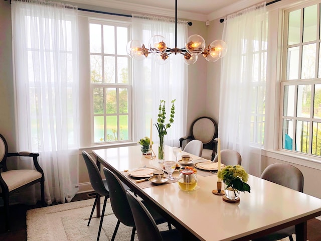 1023 Echelon Dr, Franklin, TN 37064 - dining room featuring a chandelier, healthy amount of natural light, and ornamental molding