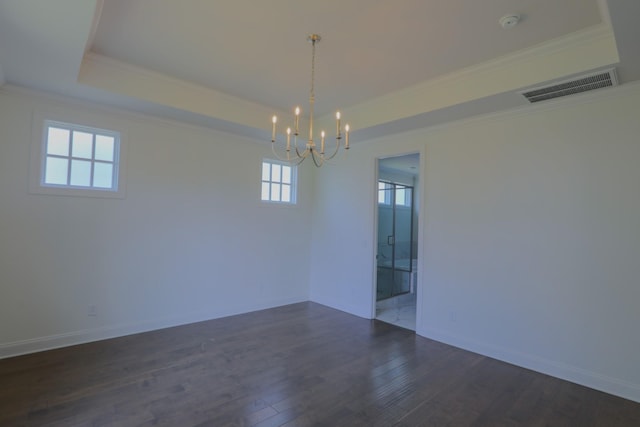 1023 Echelon Dr, Franklin, TN 37064 - unfurnished room with a chandelier, a raised ceiling, dark wood-style flooring, crown molding, and a smoke detector