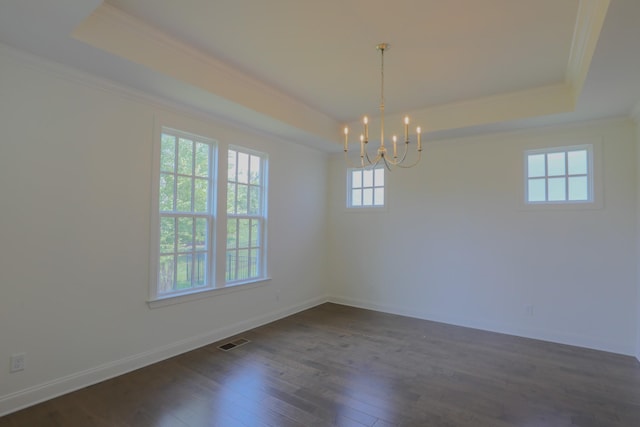 1023 Echelon Dr, Franklin, TN 37064 - empty room featuring a raised ceiling, a chandelier, ornamental molding, and dark wood-style flooring