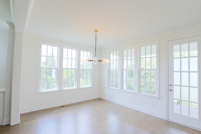 1023 Echelon Dr, Franklin, TN 37064 - unfurnished dining area with wood finished floors and a chandelier