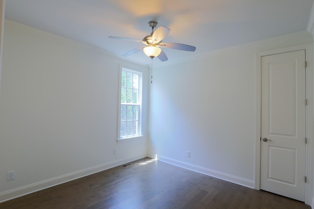 1023 Echelon Dr, Franklin, TN 37064 - empty room with dark wood-type flooring, ceiling fan, and ornamental molding
