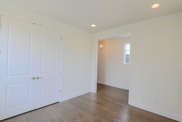 1023 Echelon Dr, Franklin, TN 37064 - unfurnished bedroom with crown molding, recessed lighting, wood finished floors, and a closet